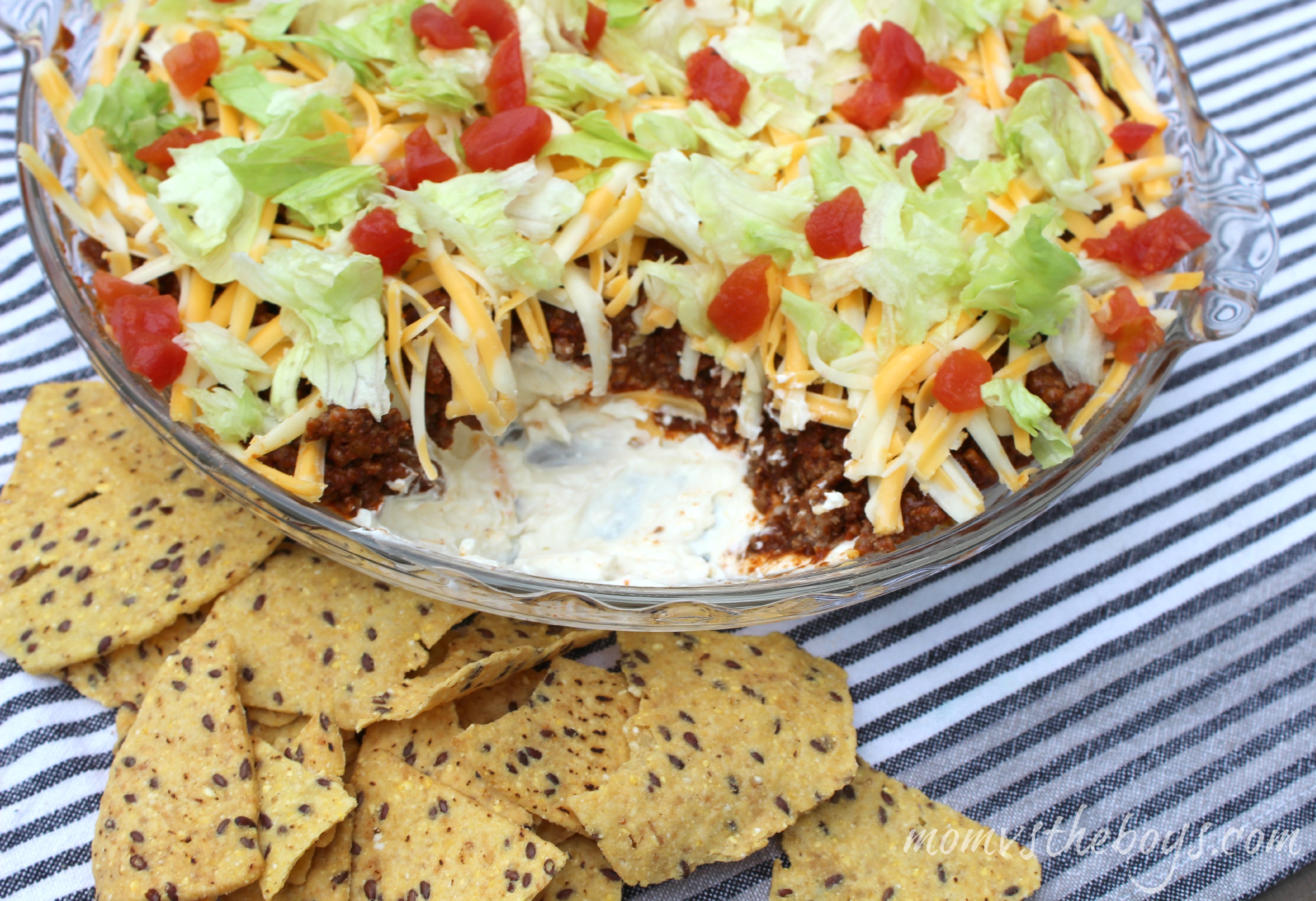 layered nacho dip with ground beef