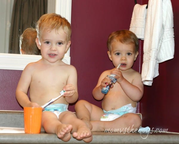 babies brushing teeth